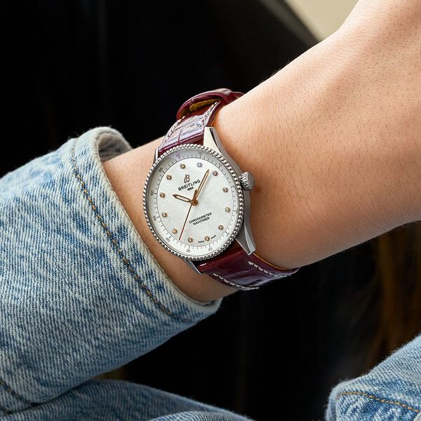 Navitimer 32 mm quartz en acier inoxydable et diamants